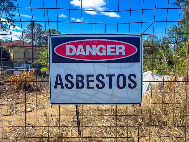 istock An Asbestos Danger sign on a fence at a construction site 2248624085