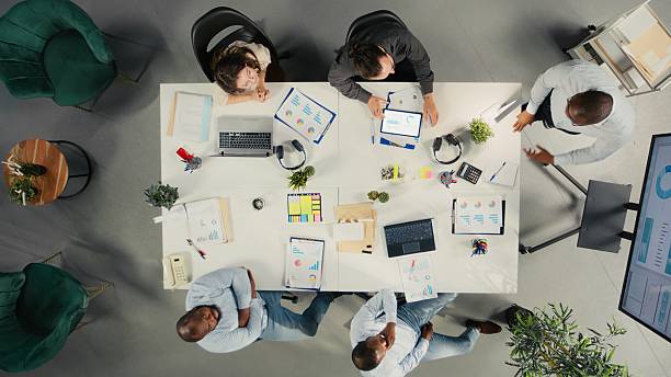 istock Top down view of conference with investors group 2248624379