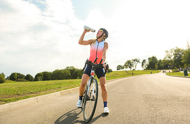 istock professional female cyclist in protective gear outdoors on a daytime 2248625884