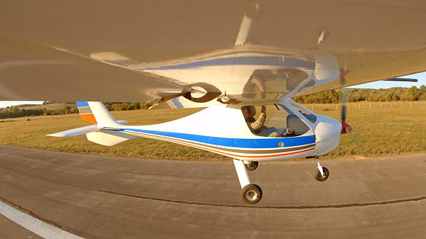 istock Senior Friends In Personal Plane Taking Off For A Flight At Sunrise 2248626816