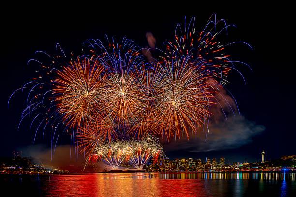istock Seattle skyline ablaze with fireworks over Puget Sound. 2248628874