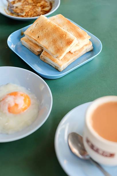 A cup of milk tea with kaya toast at Maxwell in Singapore