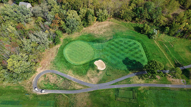 istock Vibrant greens and winding paths of a summer golf course create a serene retreat for enthusiasts and nature lovers 2248637069