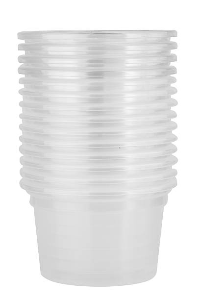 istock Clear plastic dipping sauce cups stacked on a white background 2248638590