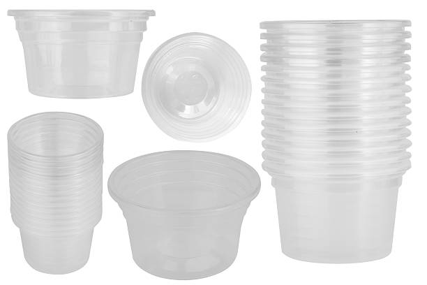 istock Clear plastic dipping sauce cups stacked on a white background 2248638593