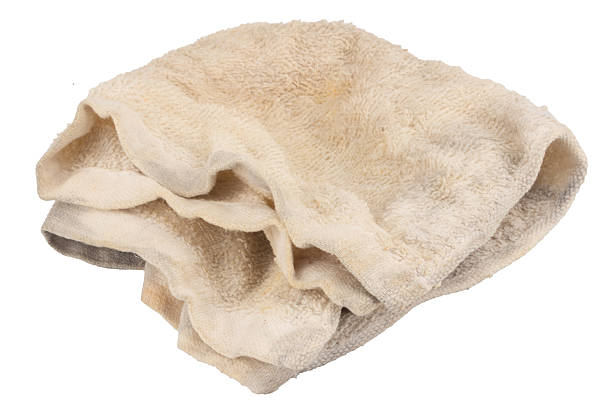 istock Used dirty white cleaning cloth on white background 2248638606