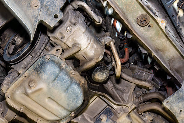 istock Engine components under a car showing wear from use leading to potential maintenance needs 2248641552
