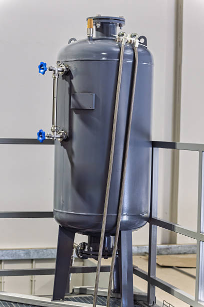 istock industrial vertical pressure vessel, equipment industrial waste treatment system that utilizes oil-based heat exchange mechanism in abattoir 2248643295