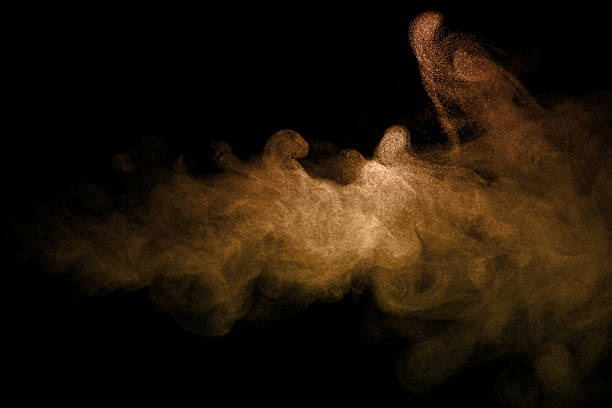 istock Sand dust, desert dust smoke texture, flying soil particles, abstract fine sand clouds, golden dust wave effect, isolated on black background. 2248645466