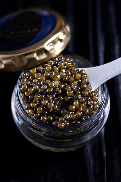 istock Luxury Caviar in Glass Jar Close-Up 2248647287