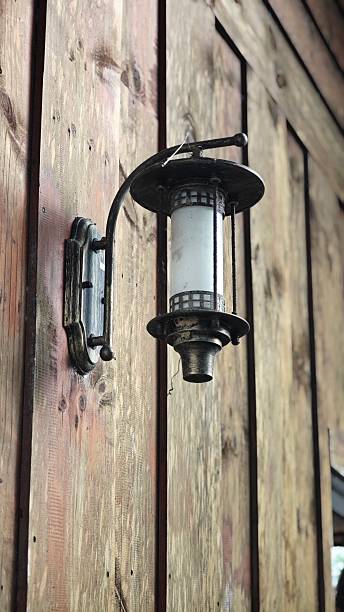 istock Vintage street lamp on wall. 2248649573