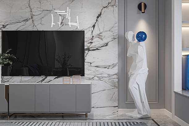 istock Luxury Modern Media Wall with Bookmatched Marble and Sculptural Figure Decoration 2248650992