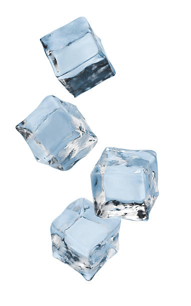istock 3D rendered image of four clear blue ice cubes falling or floating against 2248660582
