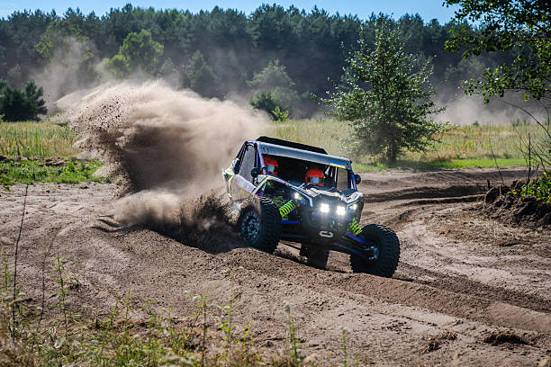 istock Cool view on UTV, rally, 4x4 riding in dusty track. Amateur competitions 2248663983