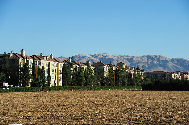 istock apartment buildings, open land for future construction in San Jose, CA 2248665667