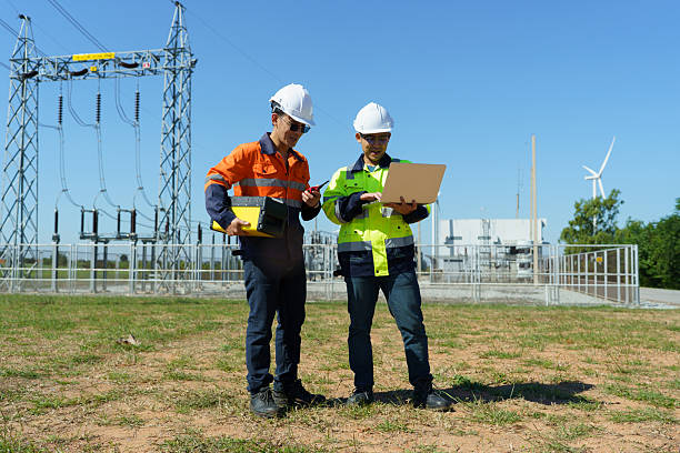 istock Engineers are checking the operation of a large wind turbine that is working to generate electricity in a wind farm. 2248675594