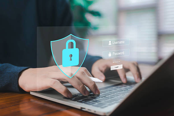 istock A glowing security shield with a lock icon above a laptop login screen represents cybersecurity, data protection, secure access, password safety, and digital privacy for modern online systems. 2248675853