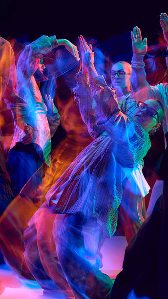 istock Dancers in dynamic neon motion blur celebrating movement 2248681235