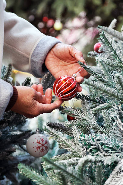 istock Holding the Christmas tree lights in both hands 2248684059