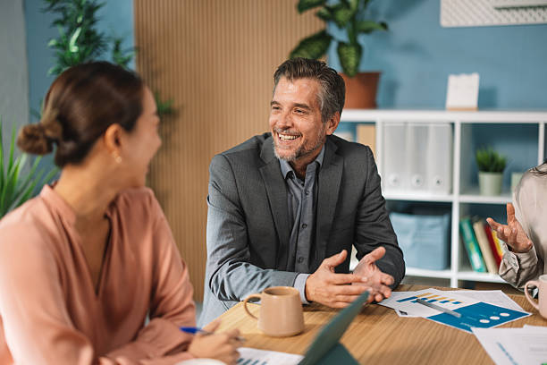 istock Business Team Engaged in Discussion Over Strategy 2248691018