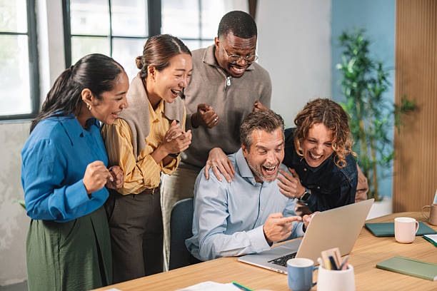 istock Ecstatic Team Exclaims Over Great News at Work 2248691070