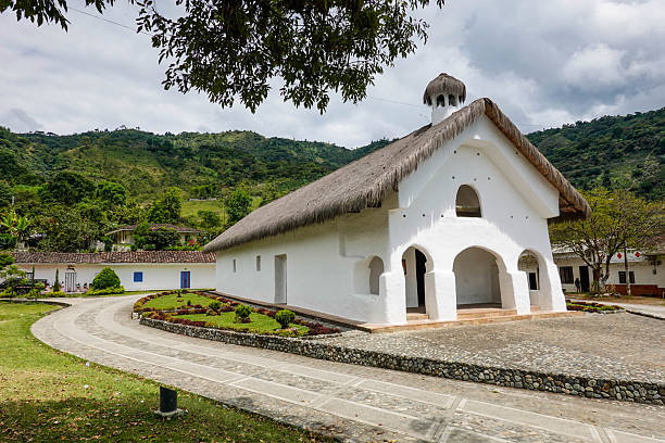 The thatched and whitewashed ancient church at San Andres de Pisimbala, home of the Tierradentro archaeological site, in Cauca, Colombia