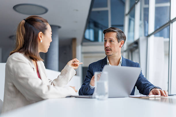 istock Business colleagues discussing work during meeting in office 2248692662