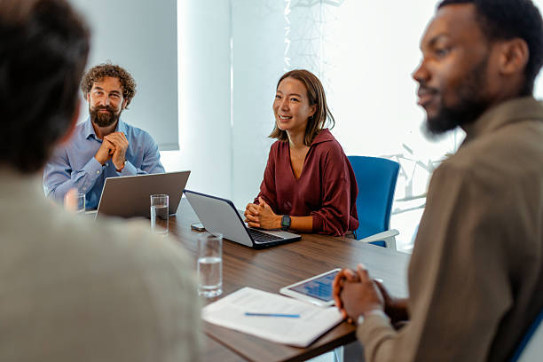 istock Diverse Business Team Collaborating in Conference Room 2248697549