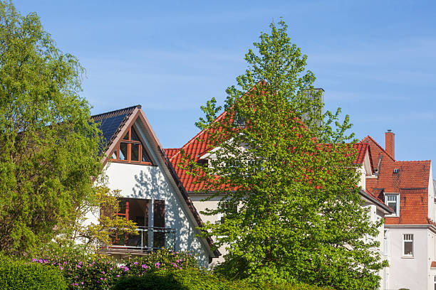 istock Modern residential building with gable in springtime greenery, Bremerhaven, Bremen 2248698828