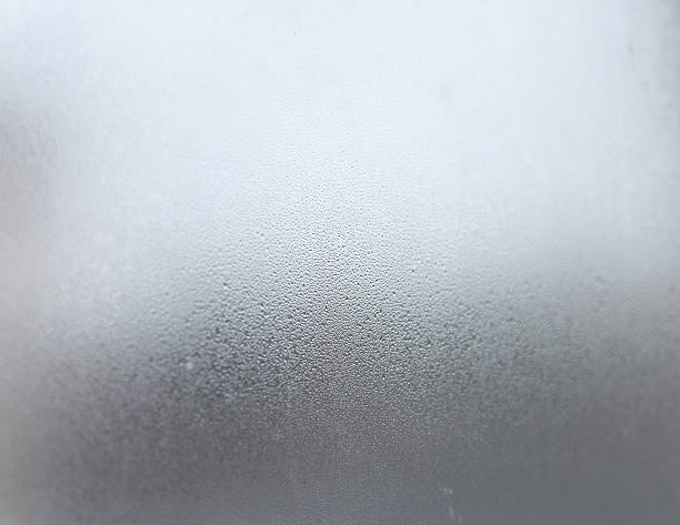 istock a close-up of a glass surface with condensation on it creating a pattern of droplets and a frosted appearance 2248703103