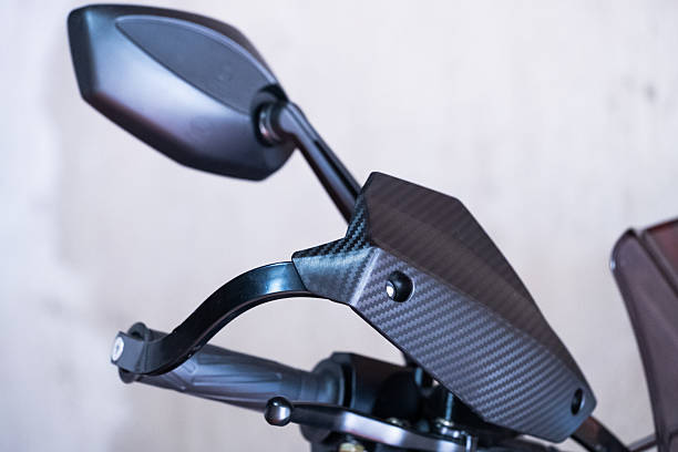 Rearview mirror and hand protection on handlebars motorcycle.