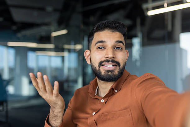 istock Indian man talking during online video call conference 2248705689