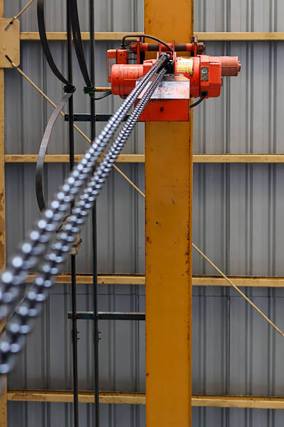 istock Industrial red chain hoist (overhead crane). 2248706133
