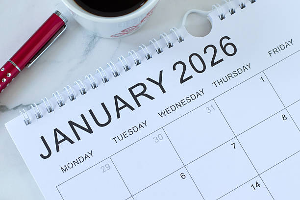 istock January 2026 calendar with pen and coffee cup 2248707336