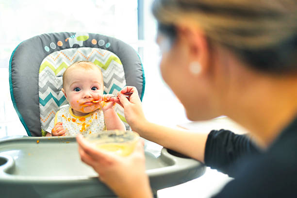 istock A happy little cute daughter with mash food everywhere 2248708980