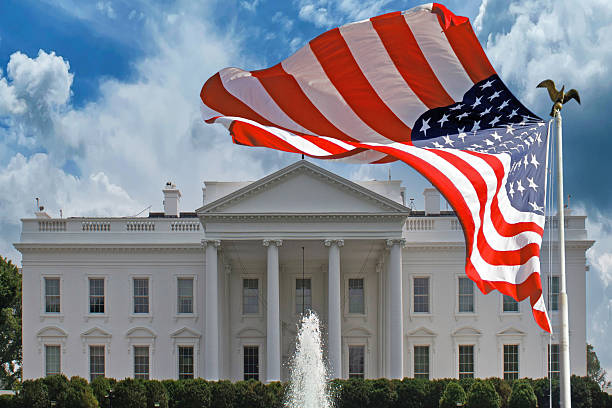 istock The White House with Waving Flag 2248709247