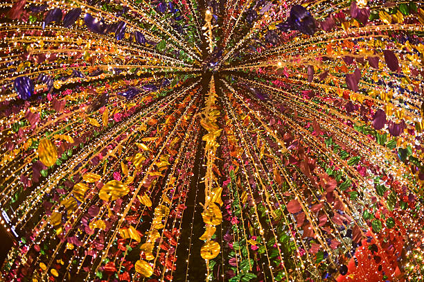 istock Texture and background of Plastic hanging with strings, illuminated with colored lights, sparkling and beautiful for Christmas day decorations. 2248713013