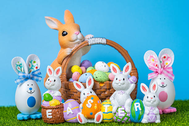 beautiful Easter decoration of bunnies on green grass