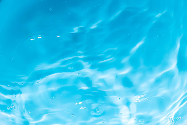 Light blue water rippled surface background