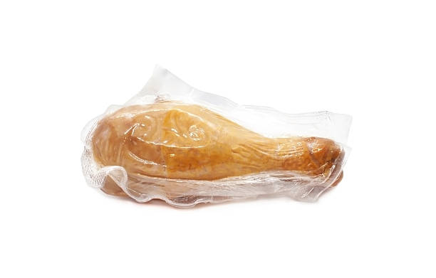 istock Smoked chicken leg in vacuum packaging isolated on white background. 2248721615
