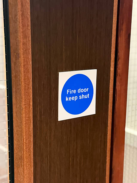 istock Image of fire door keep shut sign / warning signage indicating danger, safety notice, protective instructions, emergency compliance, hazard awareness 2248721906
