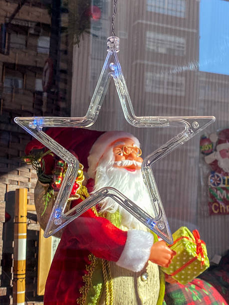 Star shape and Santa doll in store window