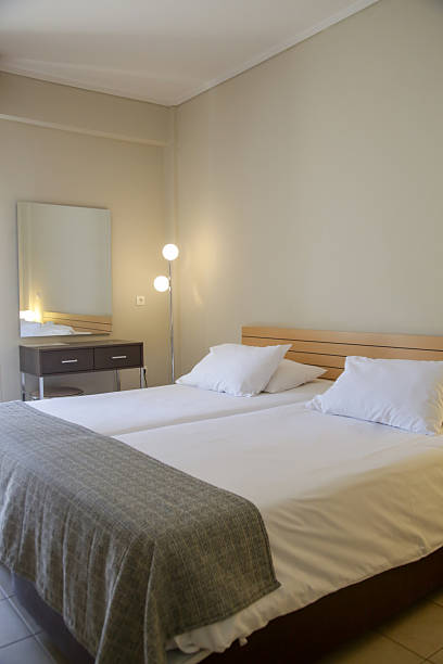 istock Simple classic bedroom suite in hotel 2248722781