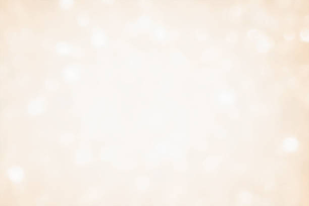 istock Golden yellow beige cream and white light glitter bokeh texture background. 2248724871