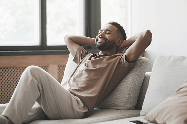istock Relaxed young man resting at home 2248725623