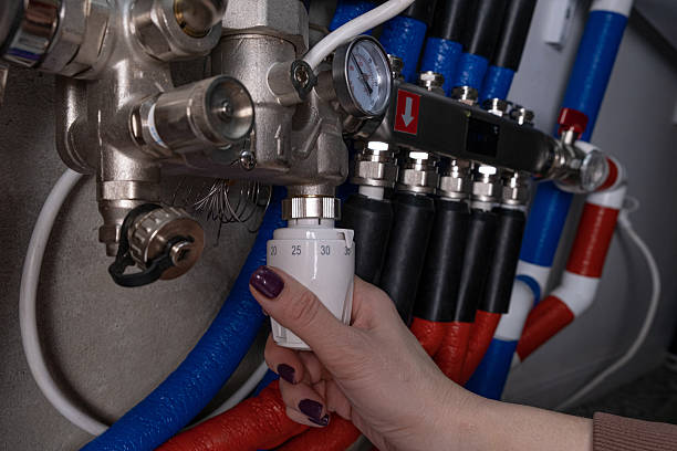 istock Complex residential heating manifold system with valves, gauges, and piping network 2248726600