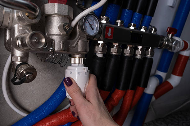 istock Complex residential heating manifold system with valves, gauges, and piping network 2248726605