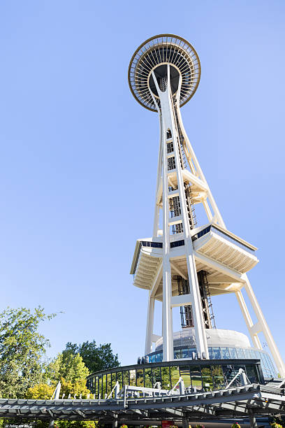 Seattle, WA, USA - May 30, 2025: The Space Needle, located in the Lower Queen Anne neighborhood, is the most famous landmark in Seattle that offers amazing views of the entire city.