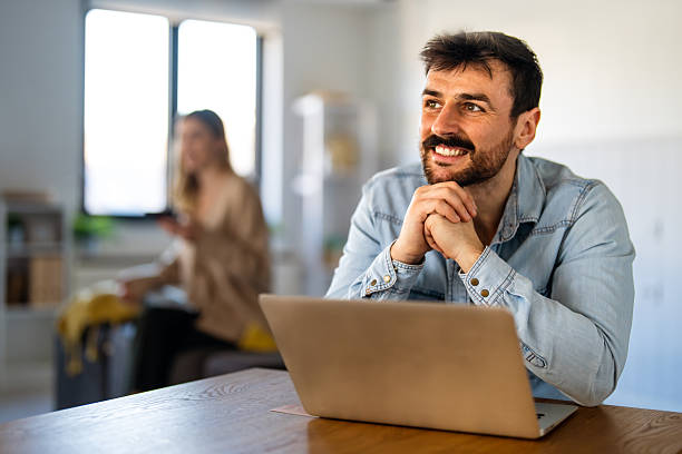 istock Business man working on laptop at home office. Remote teacher, remote studying, virtual training. 2248727146