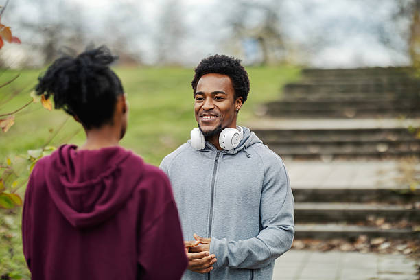 istock Black couple talking outdoors after workout in park 2248733450
